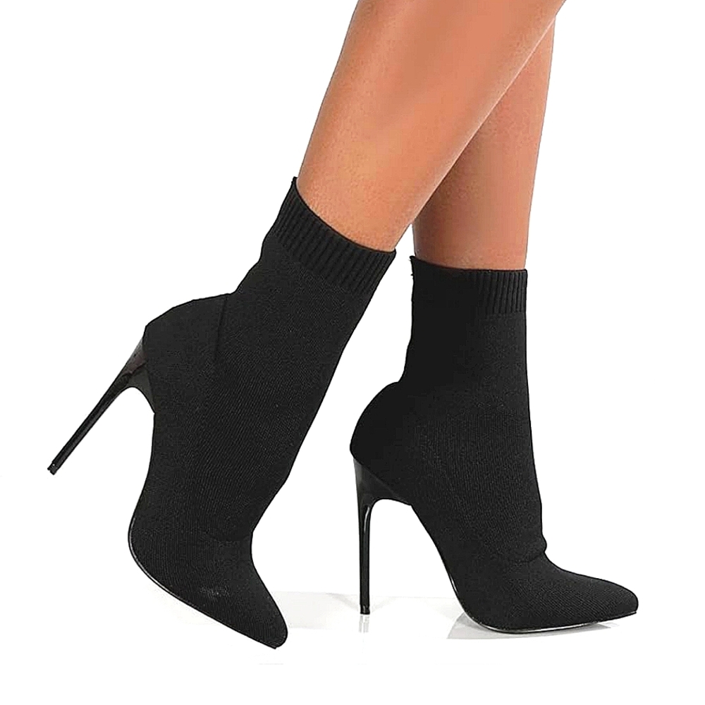 Elegant Black Heeled Boots with Pointed Toe semi-new